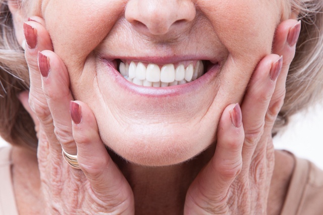 Woman smiling with dentures